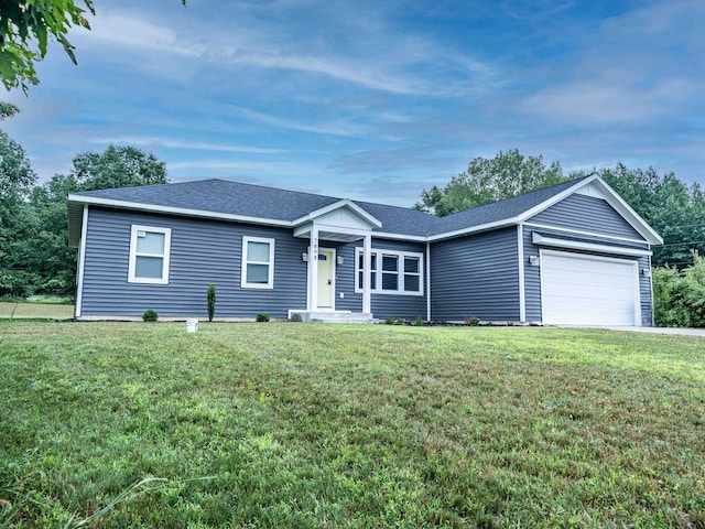 7898 W Juniper Beach Rd, Mears, MI 49436 - single story home with a garage, a front yard, and a shingled roof
