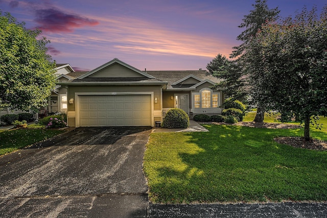 5766 Wineberry Ln SW, Wyoming, MI 49418 - single story home featuring driveway, an attached garage, and a lawn