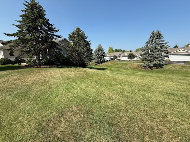 5766 Wineberry Ln SW, Wyoming, MI 49418 - view of grassy yard featuring a residential view
