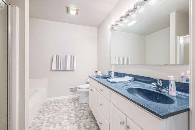 5766 Wineberry Ln SW, Wyoming, MI 49418 - bathroom featuring double vanity, a bath, and a stall shower