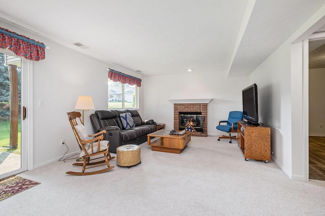 5766 Wineberry Ln SW, Wyoming, MI 49418 - living room with carpet floors and a fireplace