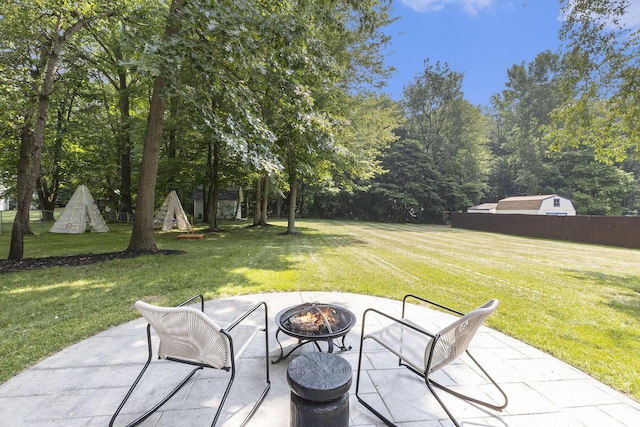12912 Valley Dr, Wayland, MI 49348 - view of patio / terrace with a fire pit