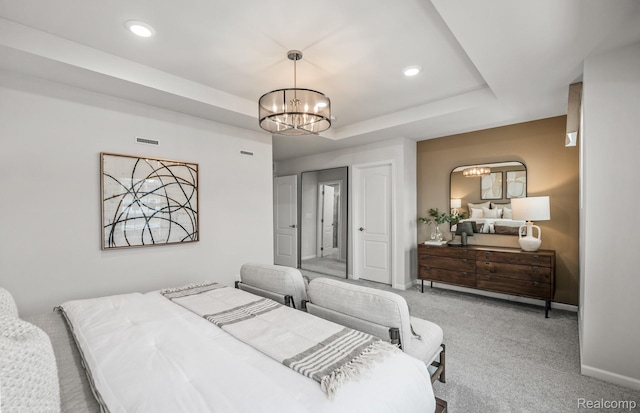 4066 Nottingham Cir, Clarkston, MI 48346 - carpeted bedroom with a chandelier, a tray ceiling, and recessed lighting