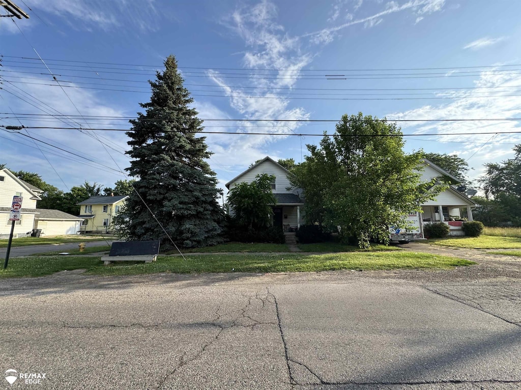 3926 W Court St, Flint, MI 48532 - view of property hidden behind natural elements
