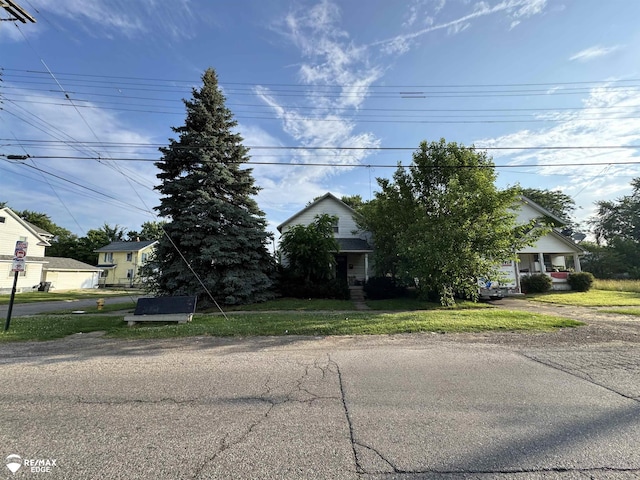 3926 W Court St, Flint, MI 48532 - view of property hidden behind natural elements