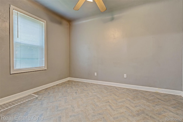 1425 Lincoln Ave, Flint, MI 48507 - unfurnished room with ceiling fan and baseboards