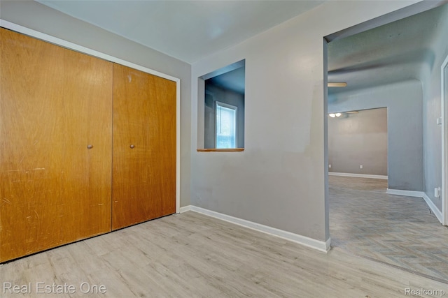 1425 Lincoln Ave, Flint, MI 48507 - unfurnished bedroom with wood finished floors and a closet