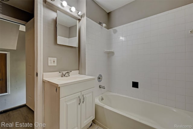1425 Lincoln Ave, Flint, MI 48507 - bathroom with vanity, shower / bath combination, and wood finished floors