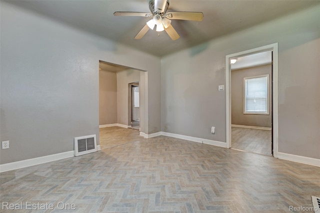 1425 Lincoln Ave, Flint, MI 48507 - empty room with ceiling fan and baseboards