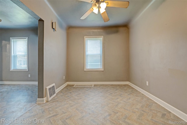 1425 Lincoln Ave, Flint, MI 48507 - empty room featuring ceiling fan and baseboards