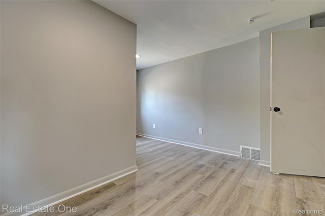 1425 Lincoln Ave, Flint, MI 48507 - spare room featuring light wood-style flooring and baseboards