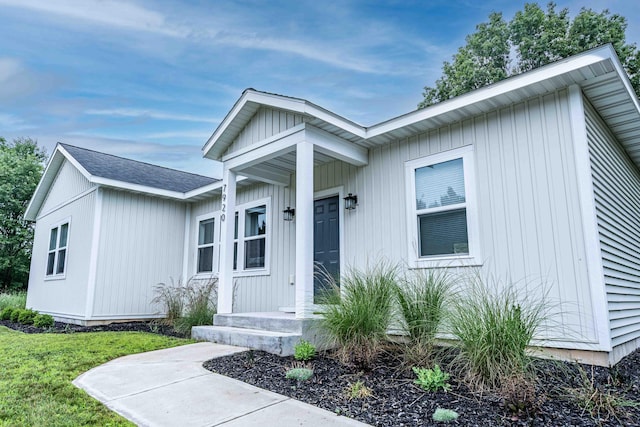 7920 W Juniper Beach Rd, Mears, MI 49436 - view of front of property featuring board and batten siding