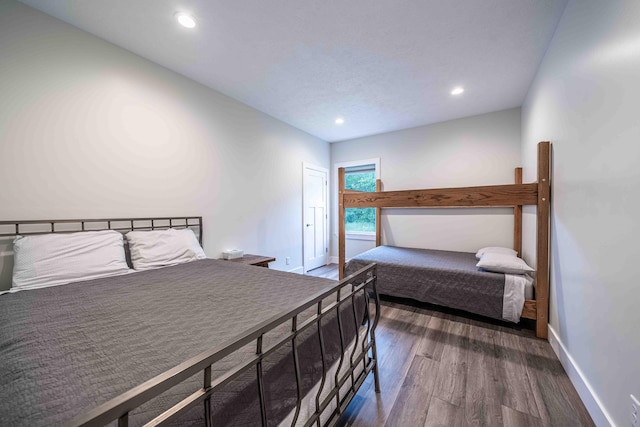7920 W Juniper Beach Rd, Mears, MI 49436 - bedroom with wood finished floors and recessed lighting