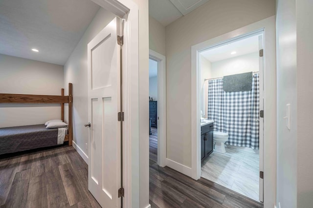 7920 W Juniper Beach Rd, Mears, MI 49436 - hall with dark wood-style floors and recessed lighting