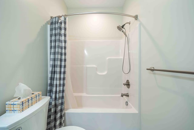 7920 W Juniper Beach Rd, Mears, MI 49436 - full bath featuring toilet and shower / bath combo with shower curtain