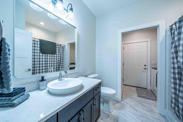 7920 W Juniper Beach Rd, Mears, MI 49436 - bathroom featuring vanity and curtained shower