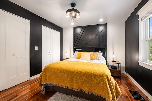 8277 Alpine Ave NW, Sparta, MI 49345 - bedroom with dark wood-type flooring and recessed lighting