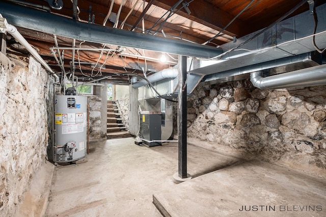 8277 Alpine Ave NW, Sparta, MI 49345 - below grade area with gas water heater