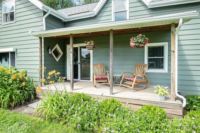 8277 Alpine Ave NW, Sparta, MI 49345 - view of exterior entry with covered porch