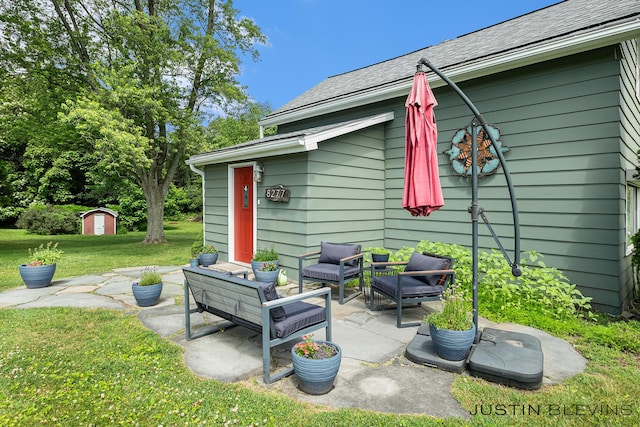 8277 Alpine Ave NW, Sparta, MI 49345 - view of patio with an outdoor hangout area and a storage shed