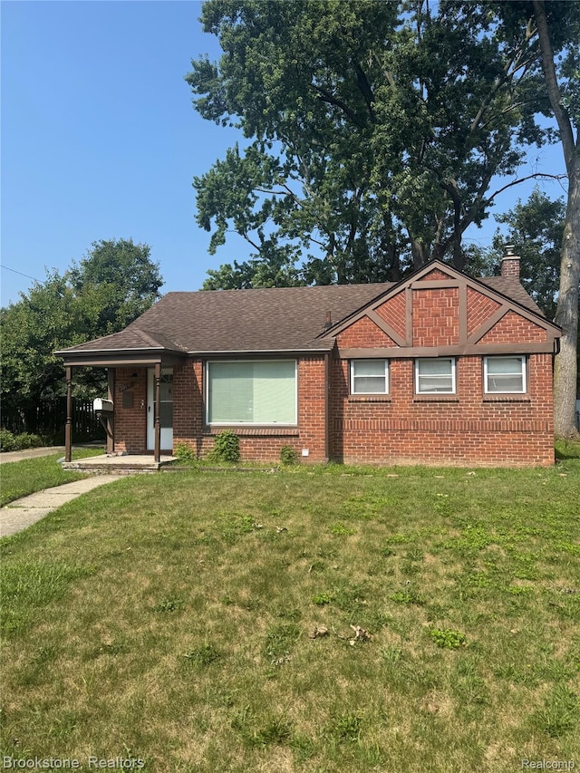 20491 Sumner, Redford, MI 48240 - ranch-style home featuring a chimney, brick siding, and a front yard