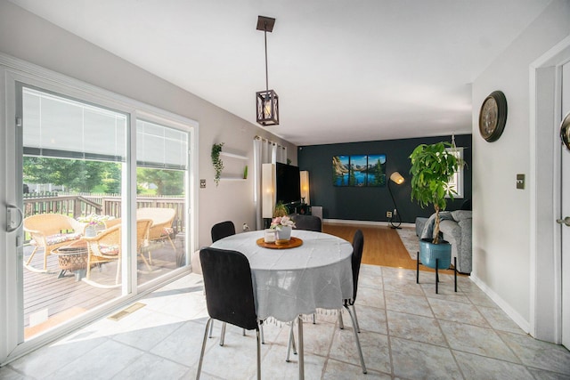 1101 Heritage Dr, Saline, MI 48176 - dining space with baseboards
