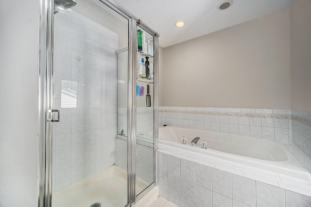 1101 Heritage Dr, Saline, MI 48176 - bathroom featuring a bath, a shower stall, and recessed lighting