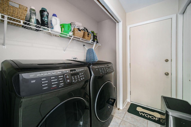 1101 Heritage Dr, Saline, MI 48176 - laundry area with washing machine and clothes dryer and tile patterned floors
