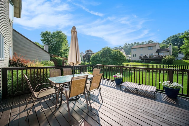 1101 Heritage Dr, Saline, MI 48176 - deck featuring outdoor dining area and a yard