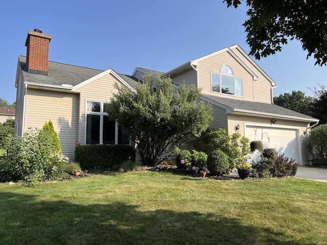 1101 Heritage Dr, Saline, MI 48176 - view of front facade featuring a chimney, a front yard, an attached garage, and concrete driveway