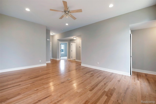 13339 Whispering Pines Ct, Linden, MI 48451 - spare room with a ceiling fan, light wood-style floors, and recessed lighting