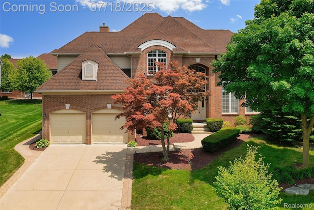24352 Cavendish Ave W, Novi, MI 48375 - french provincial home with roof with shingles, concrete driveway, a front lawn, brick siding, and a chimney