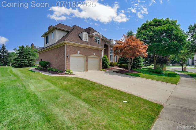 24352 Cavendish Ave W, Novi, MI 48375 - view of front of house with brick siding, a front lawn, driveway, and a chimney