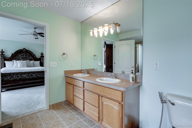 24352 Cavendish Ave W, Novi, MI 48375 - bathroom with ensuite bath, double vanity, ceiling fan, and tile patterned flooring