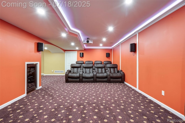 24352 Cavendish Ave W, Novi, MI 48375 - carpeted cinema room featuring beverage cooler, crown molding, recessed lighting, and arched walkways
