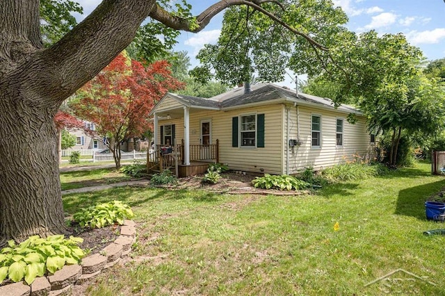114 E Sugnet Rd, Midland, MI 48642 - view of front of property featuring covered porch and a front lawn