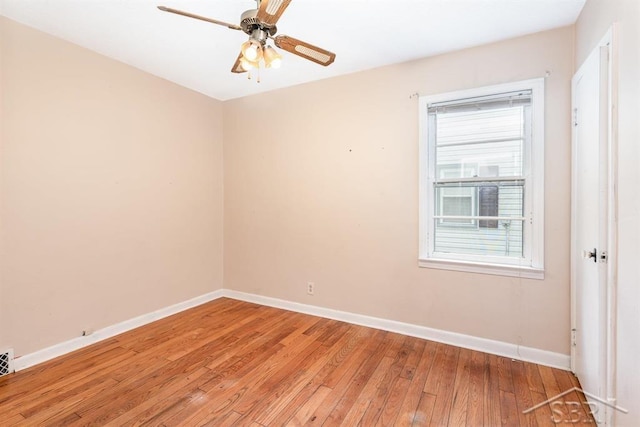 114 E Sugnet Rd, Midland, MI 48642 - empty room with light wood-style flooring and ceiling fan