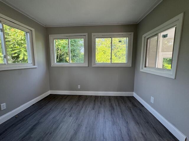 3033 Williams St, Inkster, MI 48141 - unfurnished room featuring crown molding and dark wood finished floors