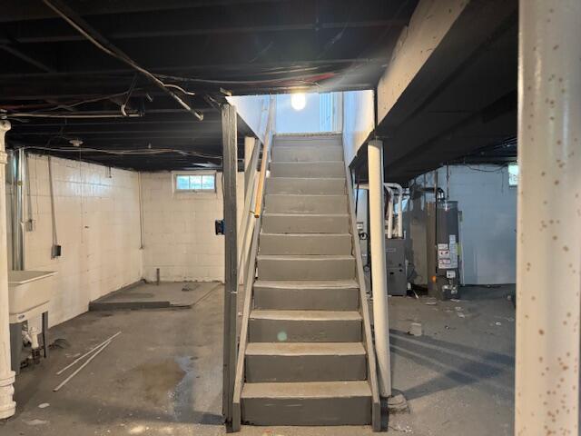 3033 Williams St, Inkster, MI 48141 - below grade area featuring water heater and stairs