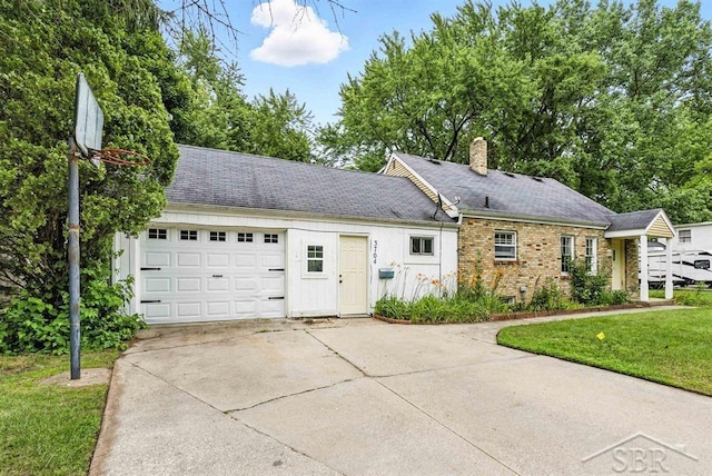 3704 Concord St, Midland, MI 48642 - single story home featuring concrete driveway, a chimney, brick siding, a garage, and a front lawn