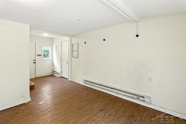 3704 Concord St, Midland, MI 48642 - empty room with wood finished floors, a baseboard heating unit, and beamed ceiling