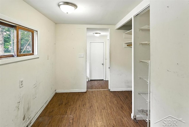 3704 Concord St, Midland, MI 48642 - spare room featuring wood finished floors and baseboards
