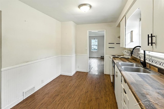 3704 Concord St, Midland, MI 48642 - kitchen featuring white cabinetry, dark wood-style floors, white electric range, open shelves, and wainscoting