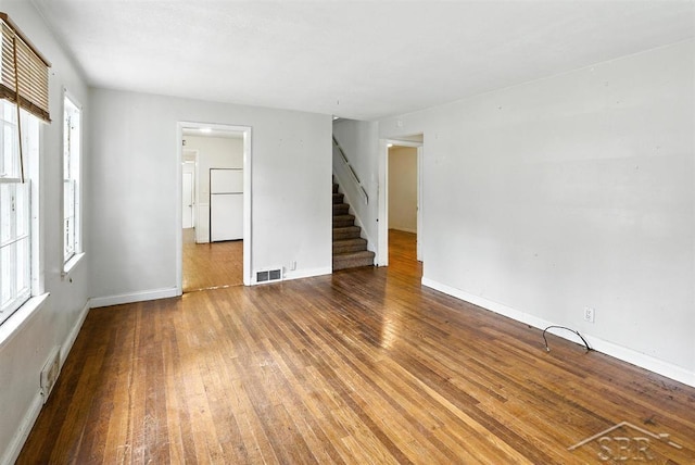 3704 Concord St, Midland, MI 48642 - empty room featuring stairway and wood finished floors