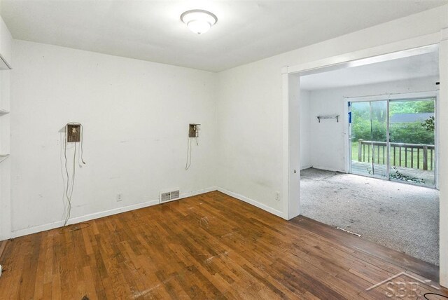 3704 Concord St, Midland, MI 48642 - spare room with hardwood / wood-style floors and baseboards