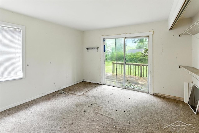 3704 Concord St, Midland, MI 48642 - unfurnished living room featuring carpet flooring and baseboards