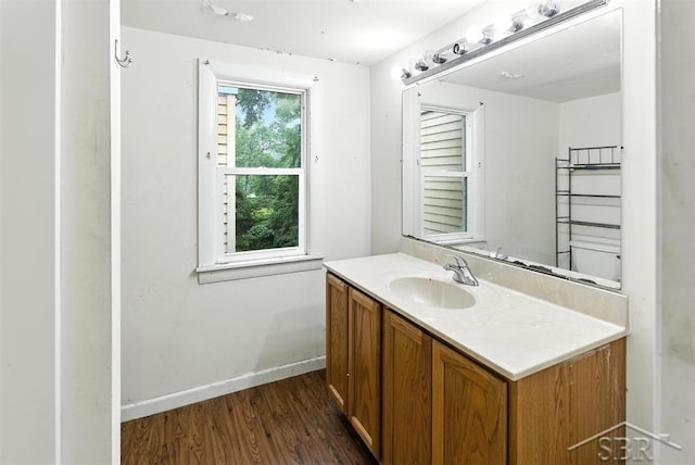 3704 Concord St, Midland, MI 48642 - bathroom with vanity and wood finished floors