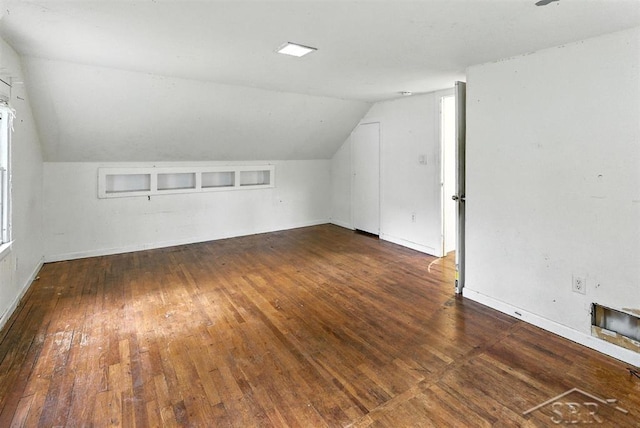 3704 Concord St, Midland, MI 48642 - additional living space featuring lofted ceiling and hardwood / wood-style floors