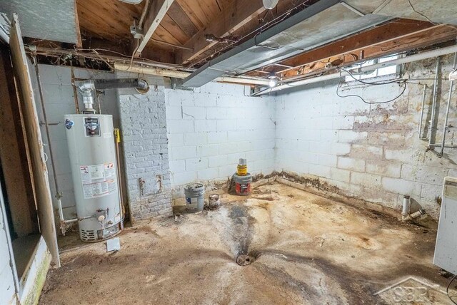 3704 Concord St, Midland, MI 48642 - unfinished below grade area with gas water heater