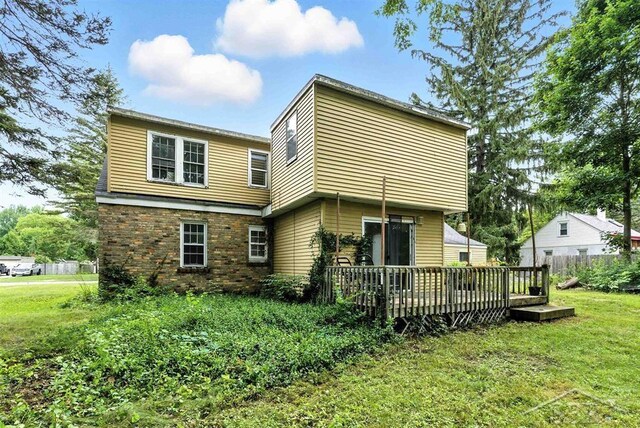 3704 Concord St, Midland, MI 48642 - rear view of property with a wooden deck